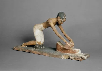 Model of a woman grinding corn, Egyptian, found at Sidmant
